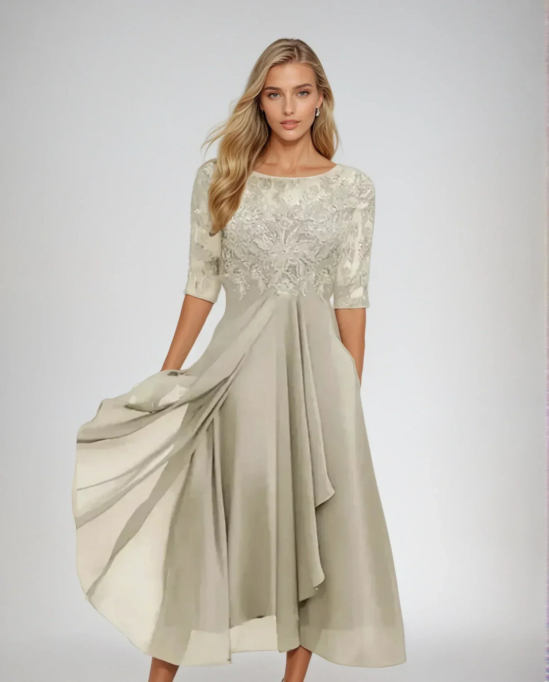 Women's formal lace midi dress with elegant three-quarter sleeves, suitable for special occasions.