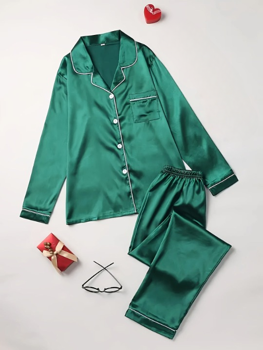 Elegant two-piece women's satin pajama set, button-up design, ideal for luxury nightwear & sleep.