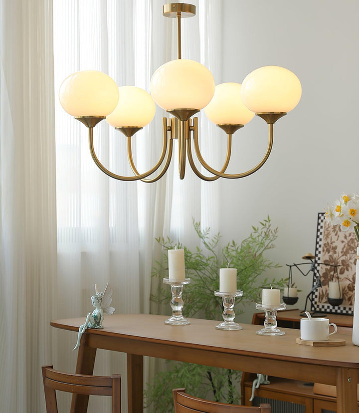 Chic chrome pendant lamp, diffused light, ideal for luxury kitchen islands.