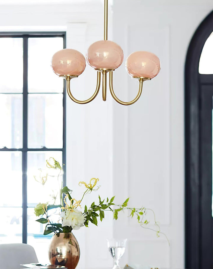 Stylish brass circle light, sleek ceiling fixture for long hallway interiors.