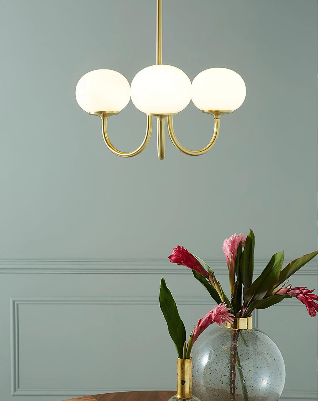 Sleek chrome glass pendant, modern lighting for bright, inviting entryways.
