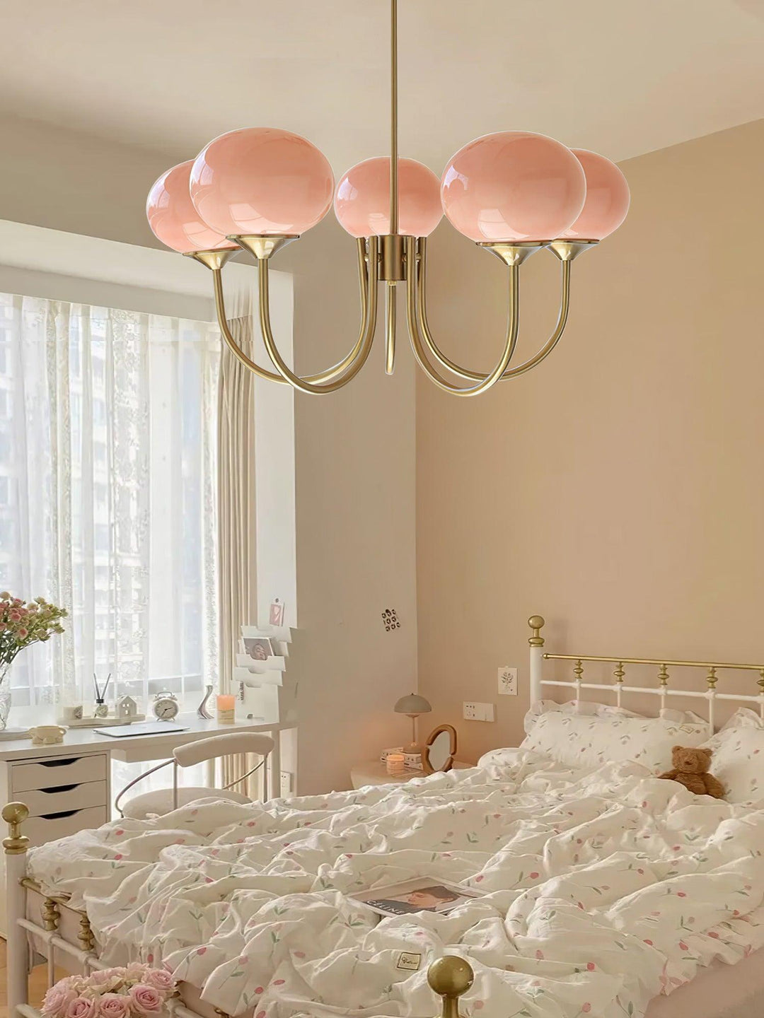 Minimalist chrome circle pendant lamp, sleek ceiling light for tranquil bedrooms.