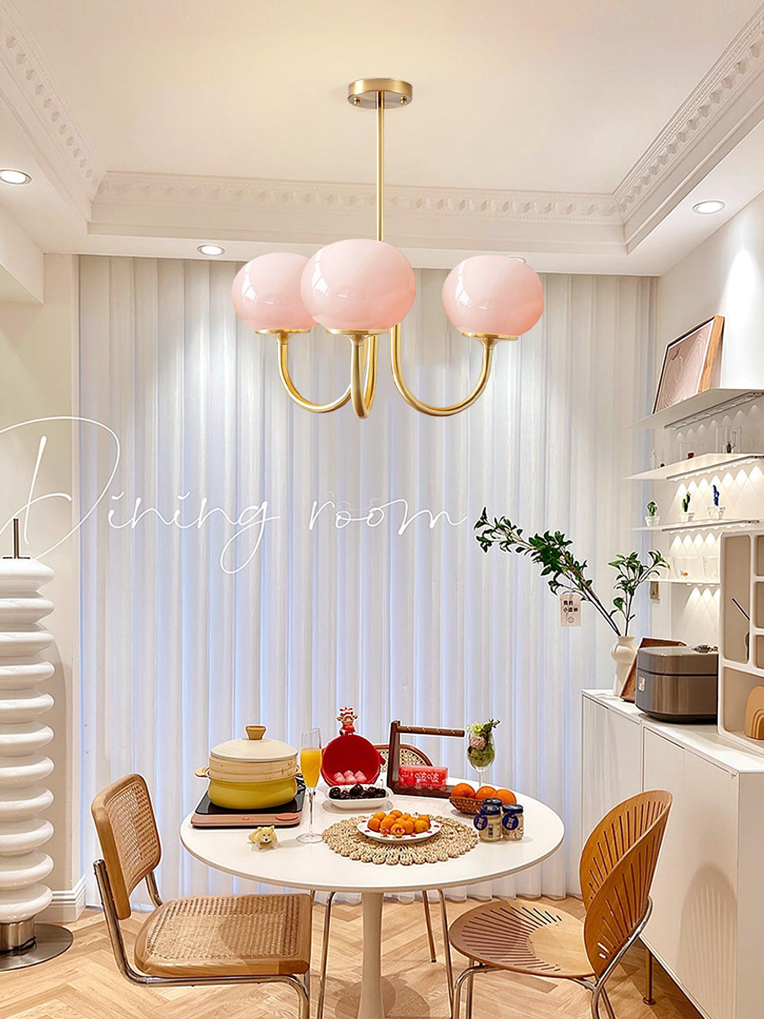 Brass glass sphere pendant, offers warm ambient light for a spacious dining room.
