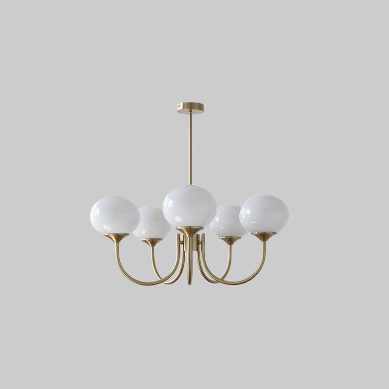 Stylish brass circle light, sleek ceiling fixture for a long hallway.