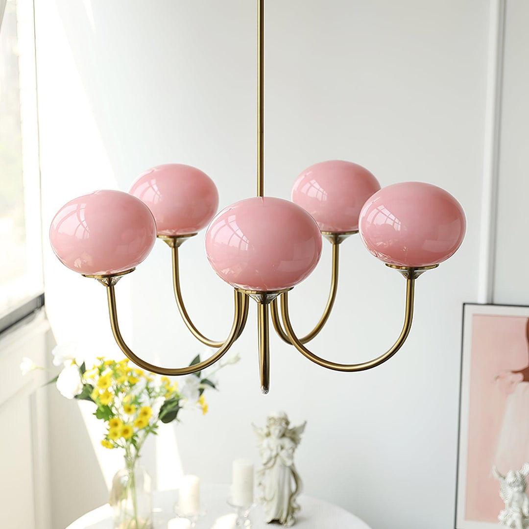 Sophisticated brass sphere pendant, unique modern lighting for entryways.