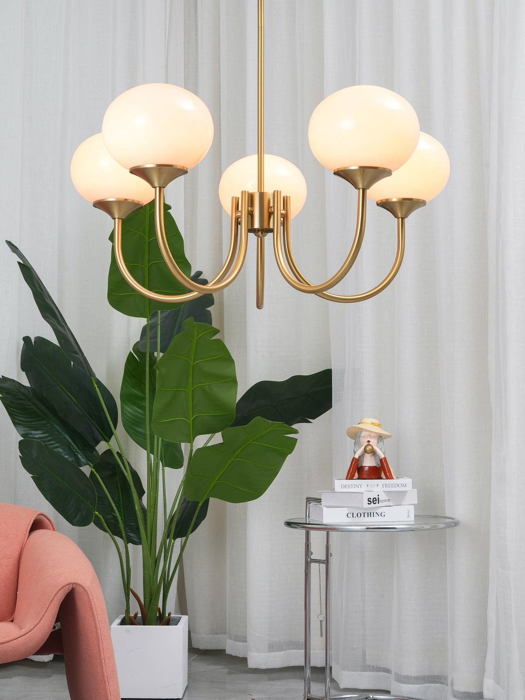 Sophisticated brass circle pendant, designer ceiling light for luxurious hallways.