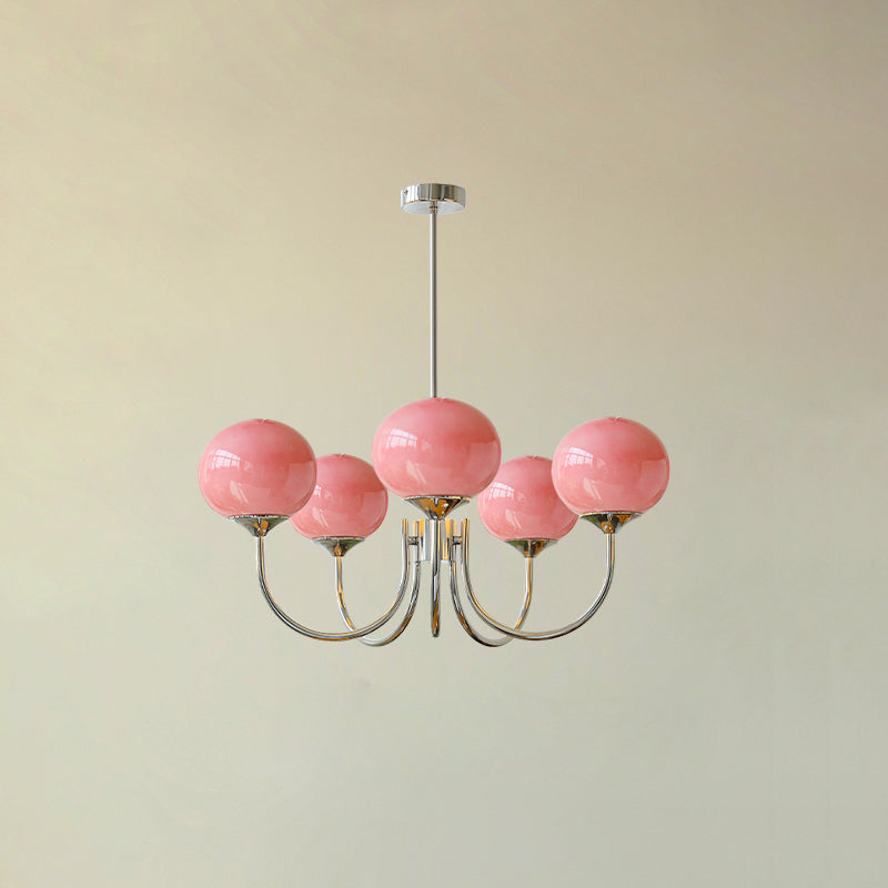 Elegant chrome pendant, glass globe, contemporary decor for a home office.