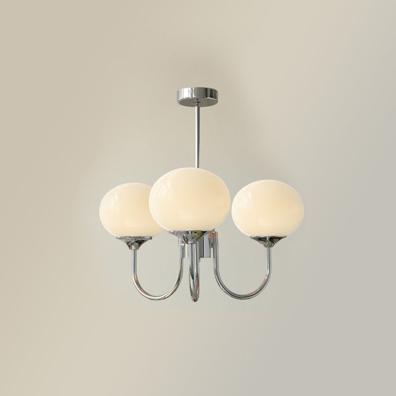 Chic chrome pendant lamp, diffused light, ideal for a luxury kitchen island.