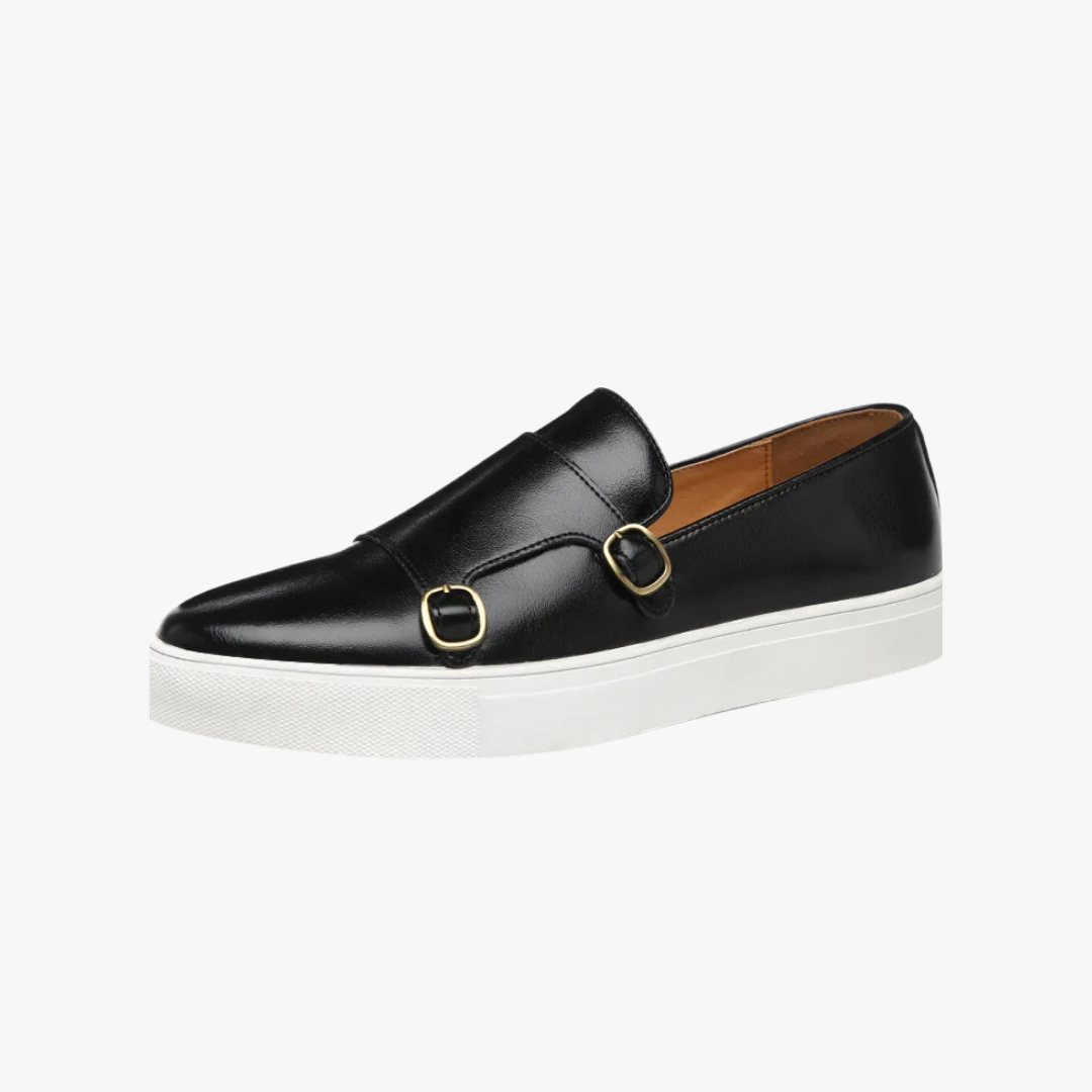 Stylish men's black slip-on loafers with elegant buckle, versatile for dress or casual sophisticated looks.