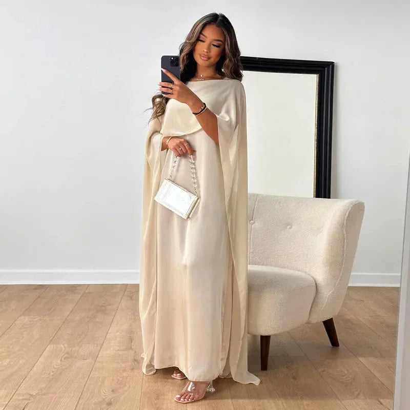Elegant women's flowy batwing sleeve maxi dress in a relaxed fit, perfect for versatile summer or casual wear.