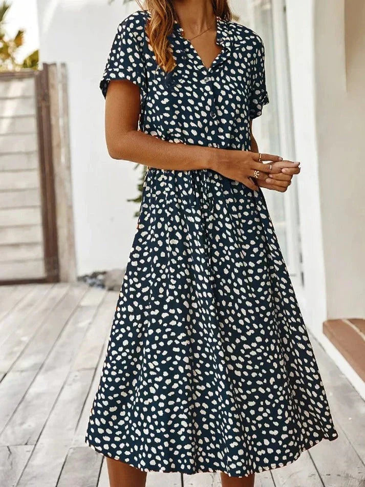 Trendy women's polka dot short sleeve shirt dress with drawstring waist for chic spring fashion.