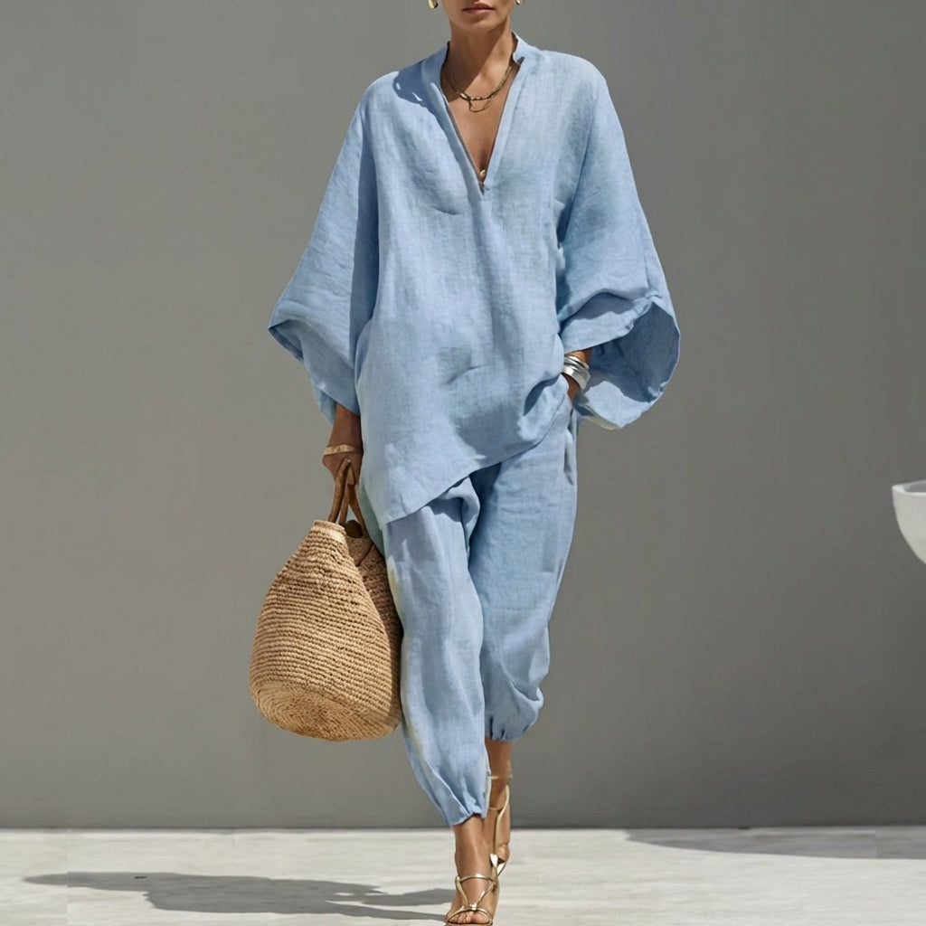 Women's V-neck two-piece loungewear set with wide-leg pants, perfect for comfy everyday style.