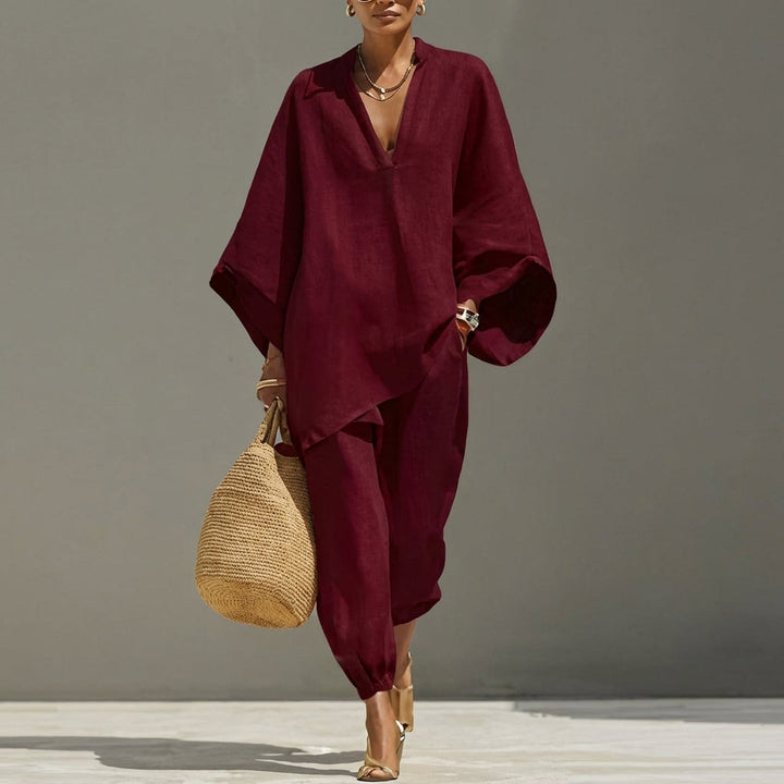 Breathable women's V-neck two-piece set with wide-leg pants, offering comfort for casual summer fashion.