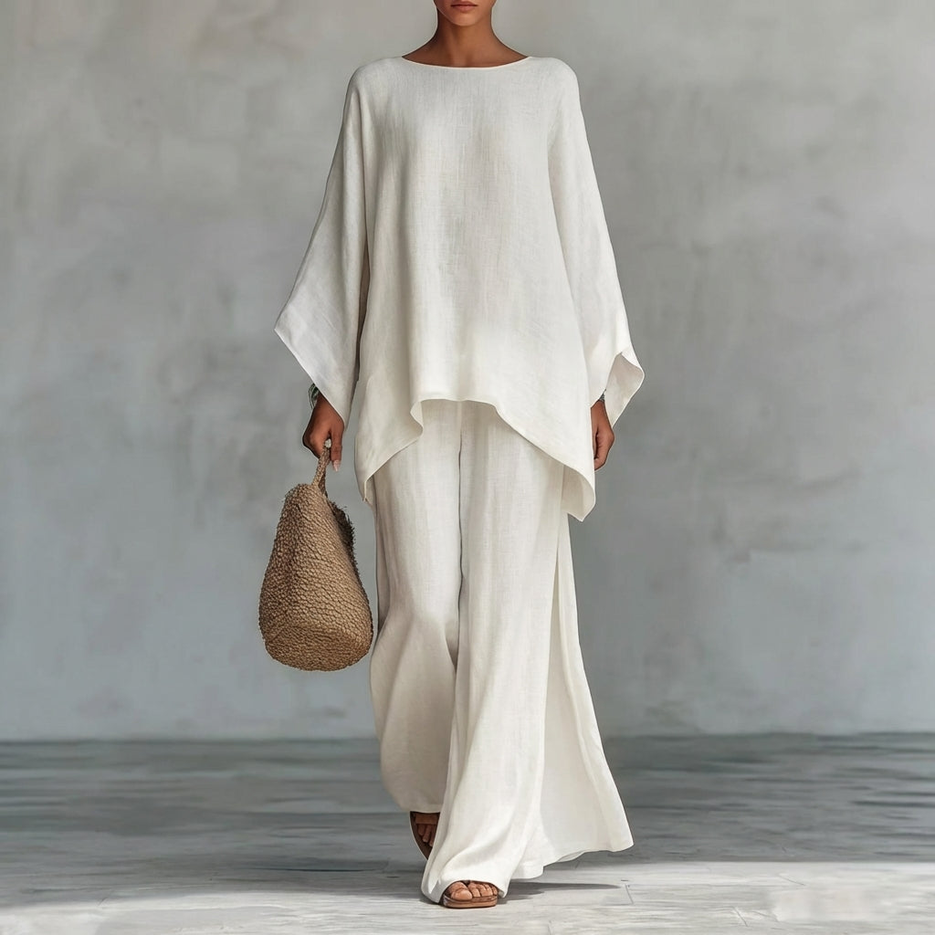 Elegant women's long sleeve top & wide-leg pants two-piece set, perfect for casual or resort wear.