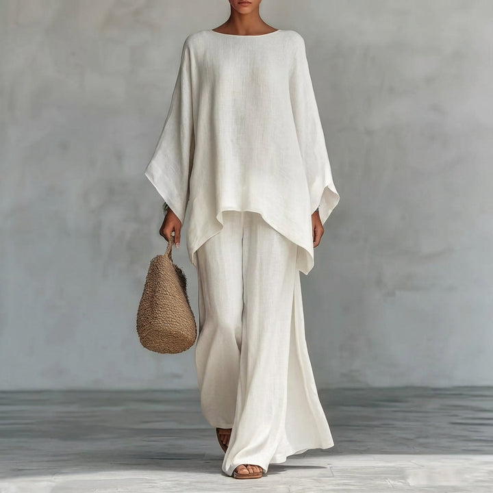 Elegant women's long sleeve top & wide-leg pants two-piece set, perfect for casual or resort wear.