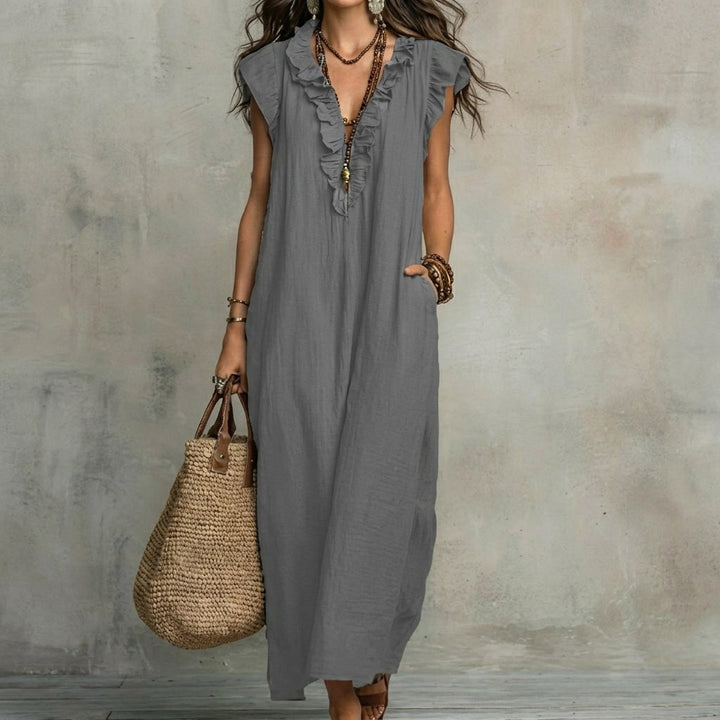 Chic women's summer maxi dress, featuring a comfortable A-line cut and elegant V-neck ruffles.