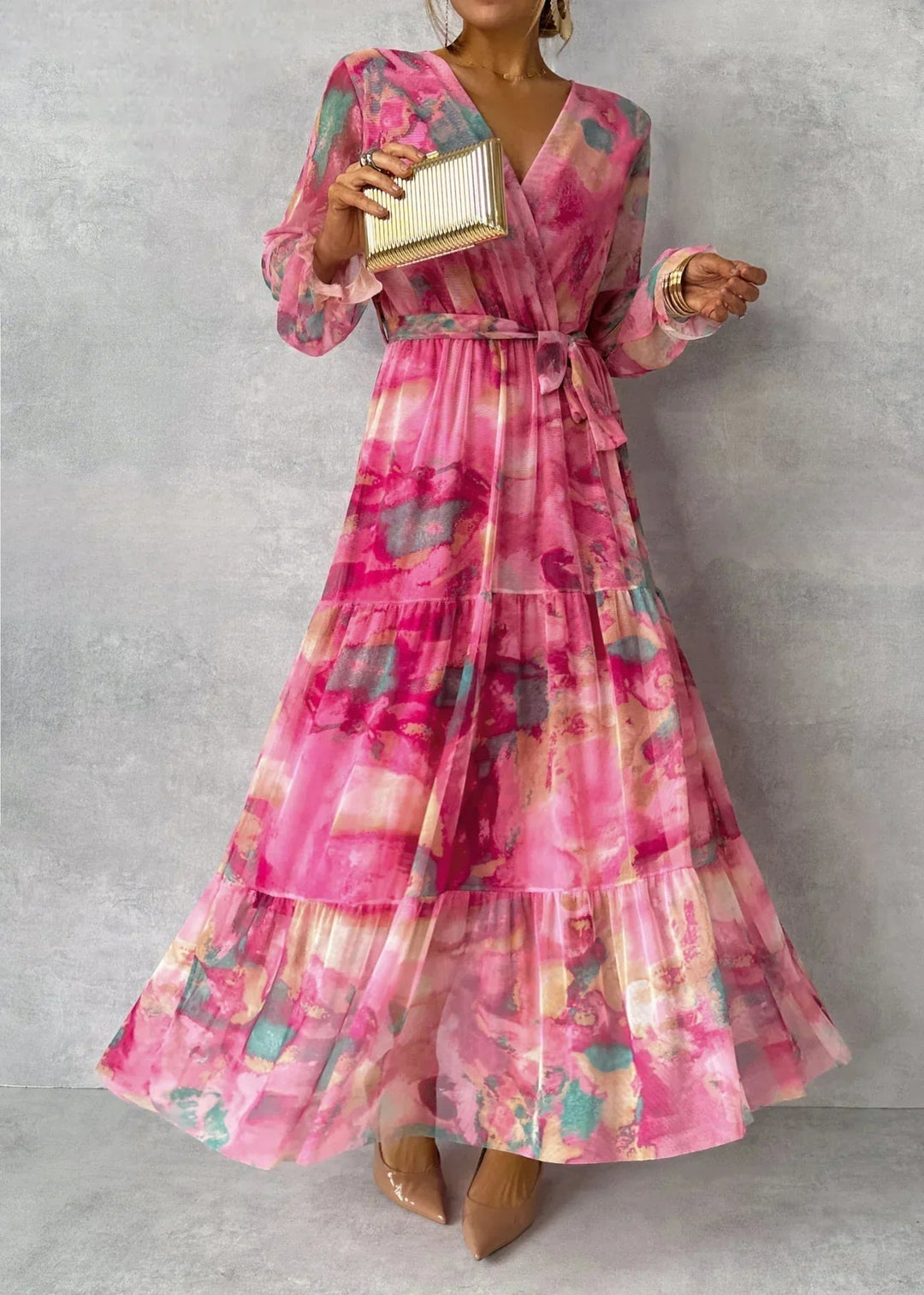 Long, elegant women's floral wrap dress. Ideal for formal occasions, summer events & spring fashion.