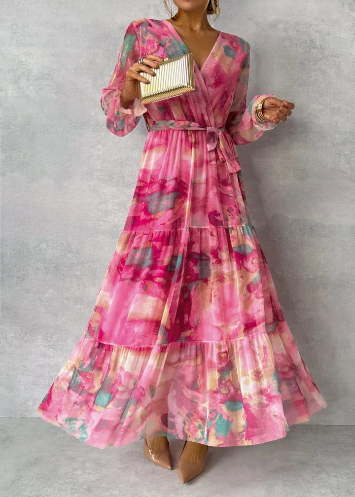 Long, elegant women's floral wrap dress. Ideal for formal occasions, summer events & spring fashion.