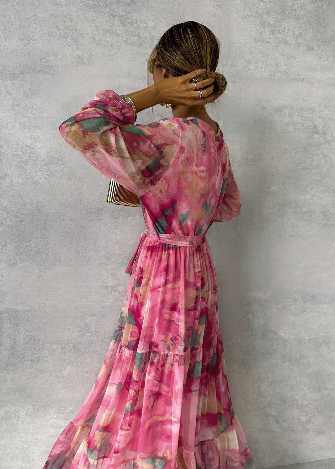 Pink floral print wrap dress for women. Stylish and elegant, suitable for special occasions & formal wear.