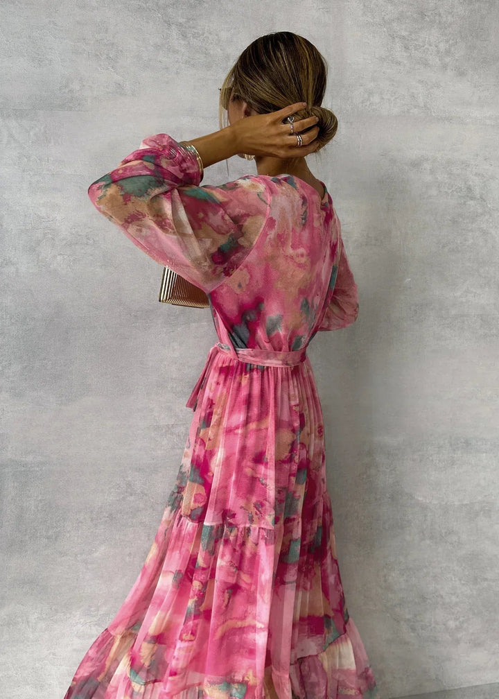 Pink floral print wrap dress for women. Stylish and elegant, suitable for special occasions & formal wear.