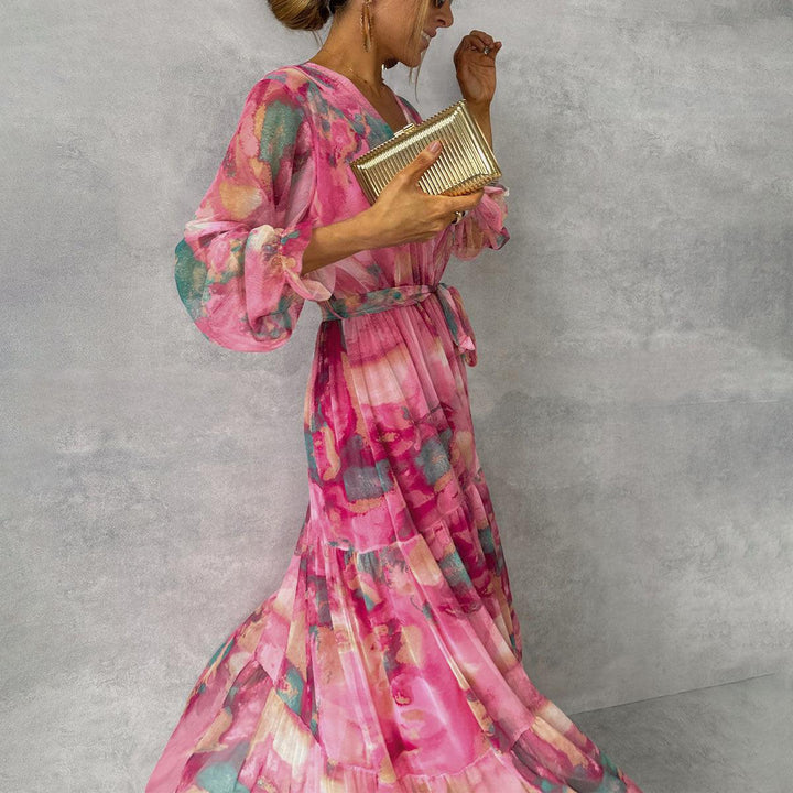 Elegant women's pink floral print wrap dress, perfect for spring/summer parties & wedding guests.