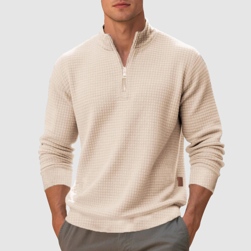 Comfortable men's textured knit quarter-zip sweater with stand collar, a stylish pullover for winter.