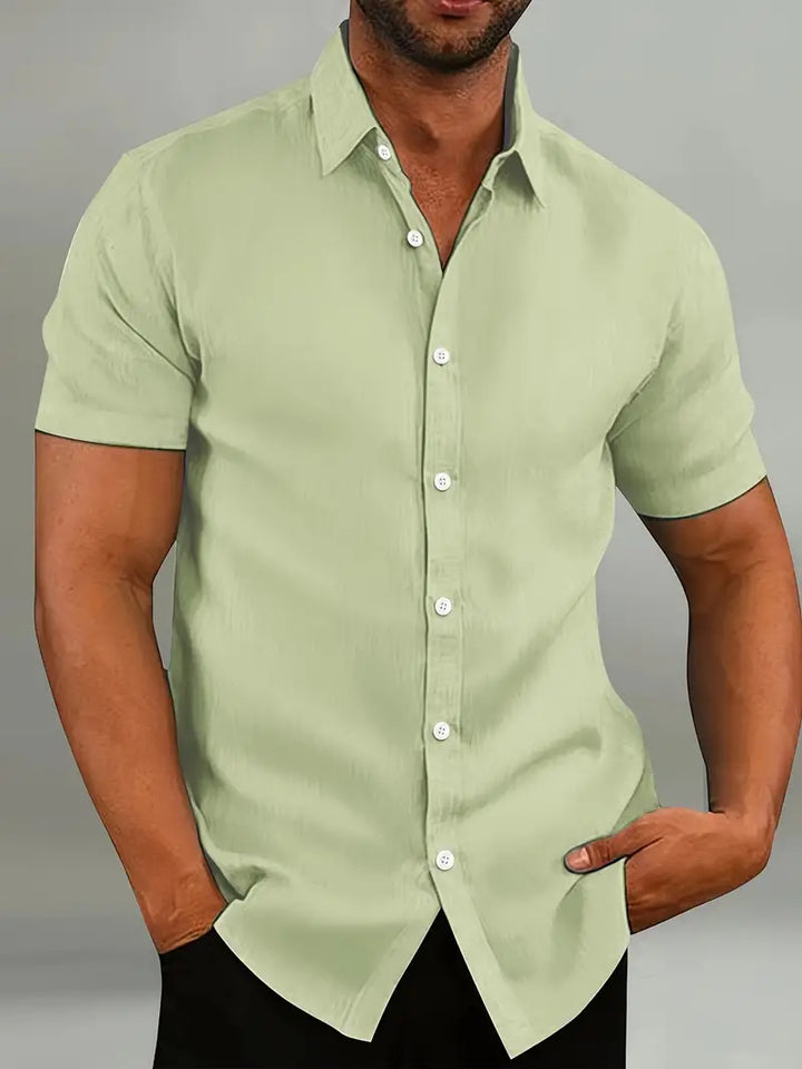Men's summer shirt: short-sleeve, collared, lightweight fabric for a classic, relaxed look.