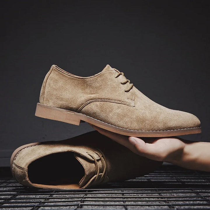 Classic men's dress shoes, black leather lace-up, perfect for elegant formal wear.
