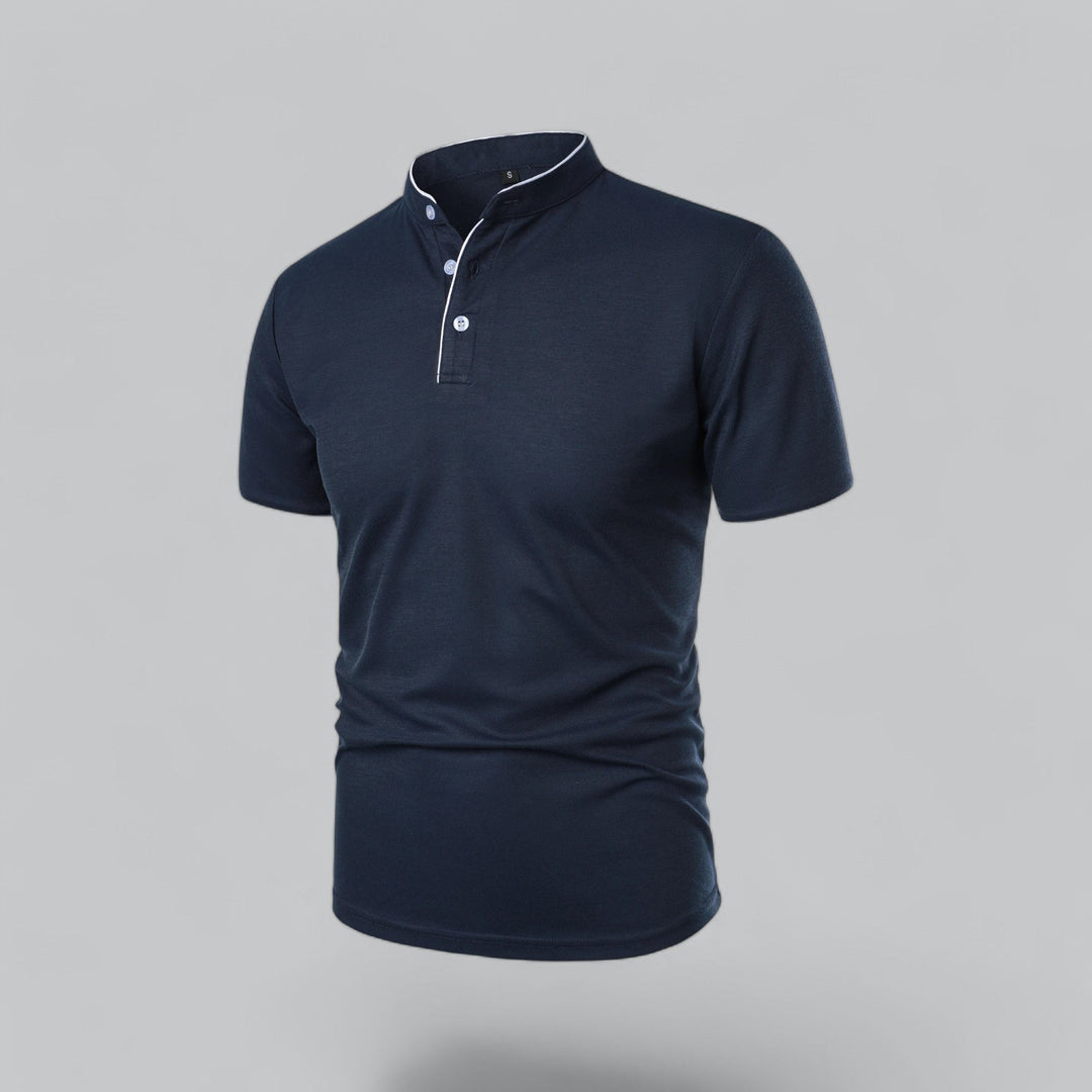 Man wearing a collarless polo shirt, exuding old money style & smart casual charm.