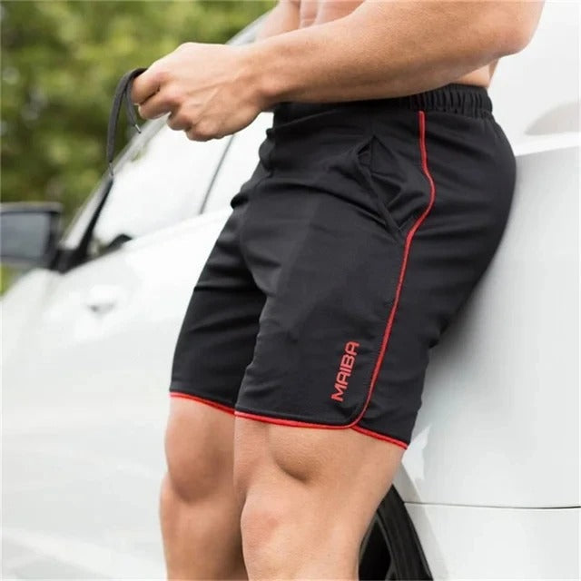 Man running in slim fit athletic shorts. Men's performance activewear for sports & high-intensity workouts. Breathable.