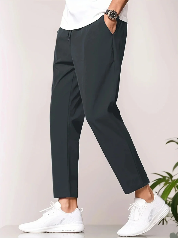 Lightweight men's tapered trousers, perfect for summer travel. Casual fit with elastic waist for ultimate comfort.