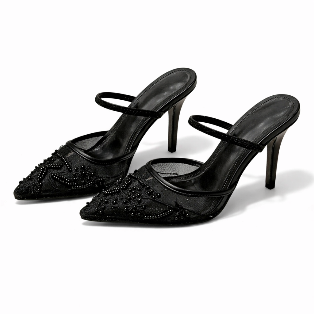 Feminine slip-on mule heels featuring intricate floral embroidery & a sleek pointed toe for formal occasions.