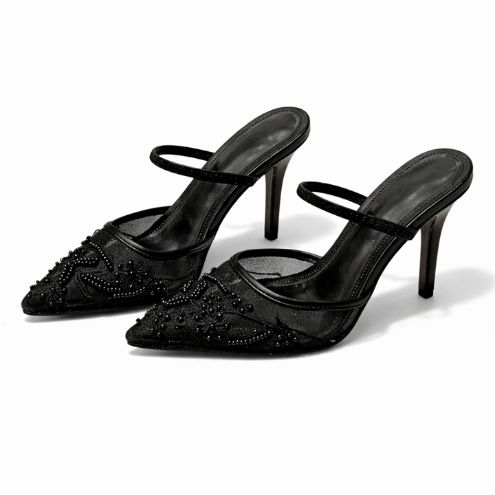 Feminine slip-on mule heels featuring intricate floral embroidery & a sleek pointed toe for formal occasions.