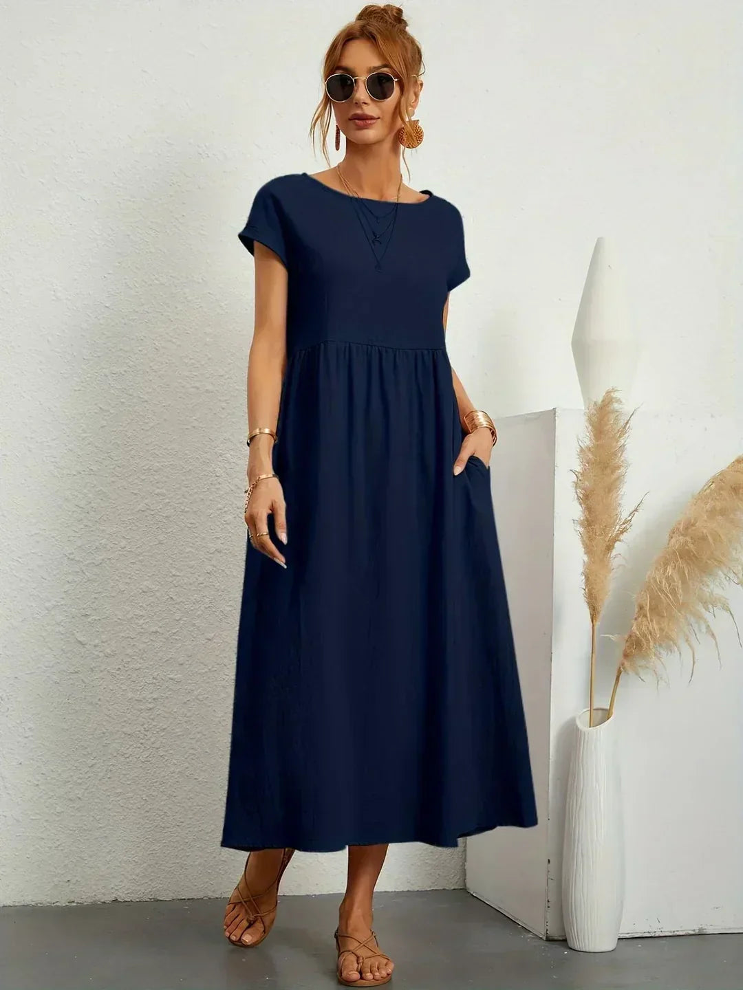 Versatile Velori women's dress, elegant midi style, perfect for summer days.