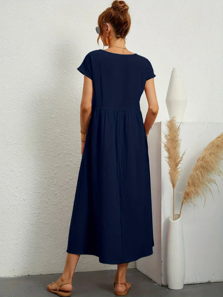 Women's fashion midi dress, offering effortless style & ultimate comfort.