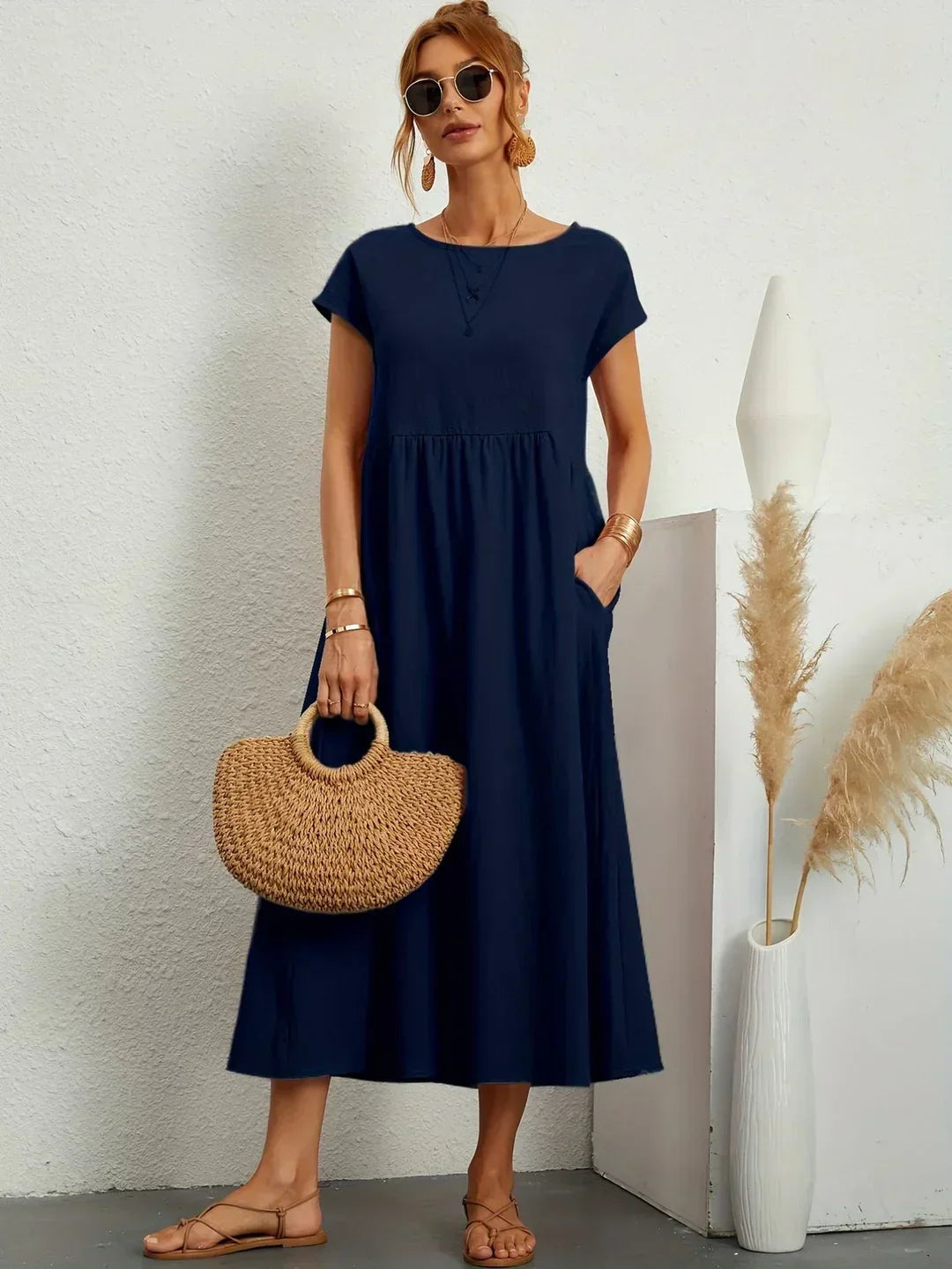 Flowing midi dress for women, embodying timeless elegance & effortless comfort.