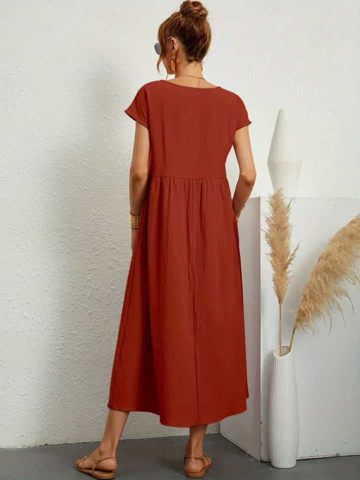 Lightweight women's elegant day dress, ideal for summer fashion & comfort.