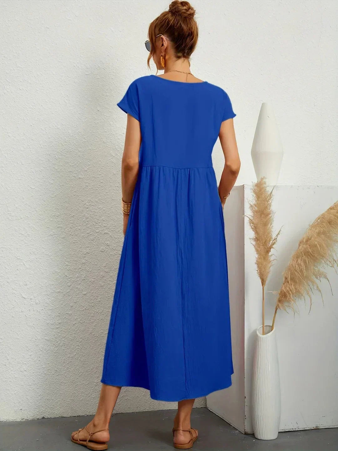 Elegant women's summer day dress, casual design for comfortable wear.