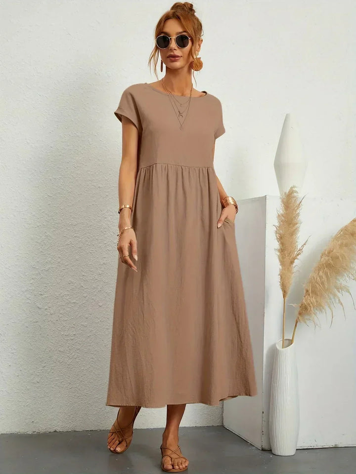 Comfortable women's flowing midi dress, a timeless piece for a chic wardrobe.