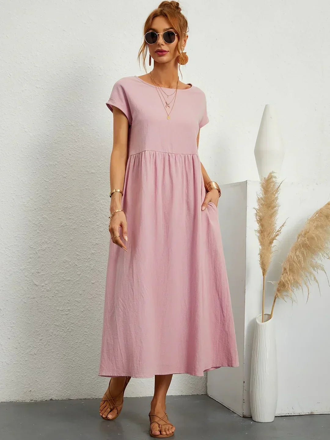 Elegant women's flowing midi dress, a comfortable choice for chic spring summer fashion.