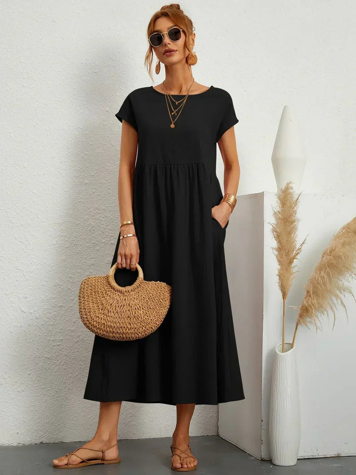 Timeless women's midi dress, elegant design and comfortable for everyday or special occasions.