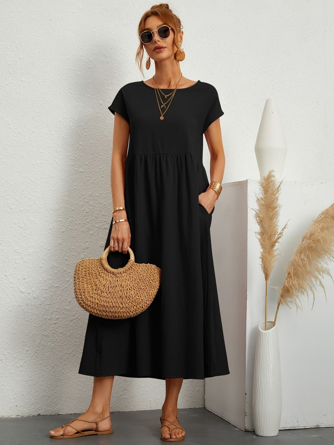 Formal women's elegant midi dress, featuring a round neck, suitable for special occasions or work.