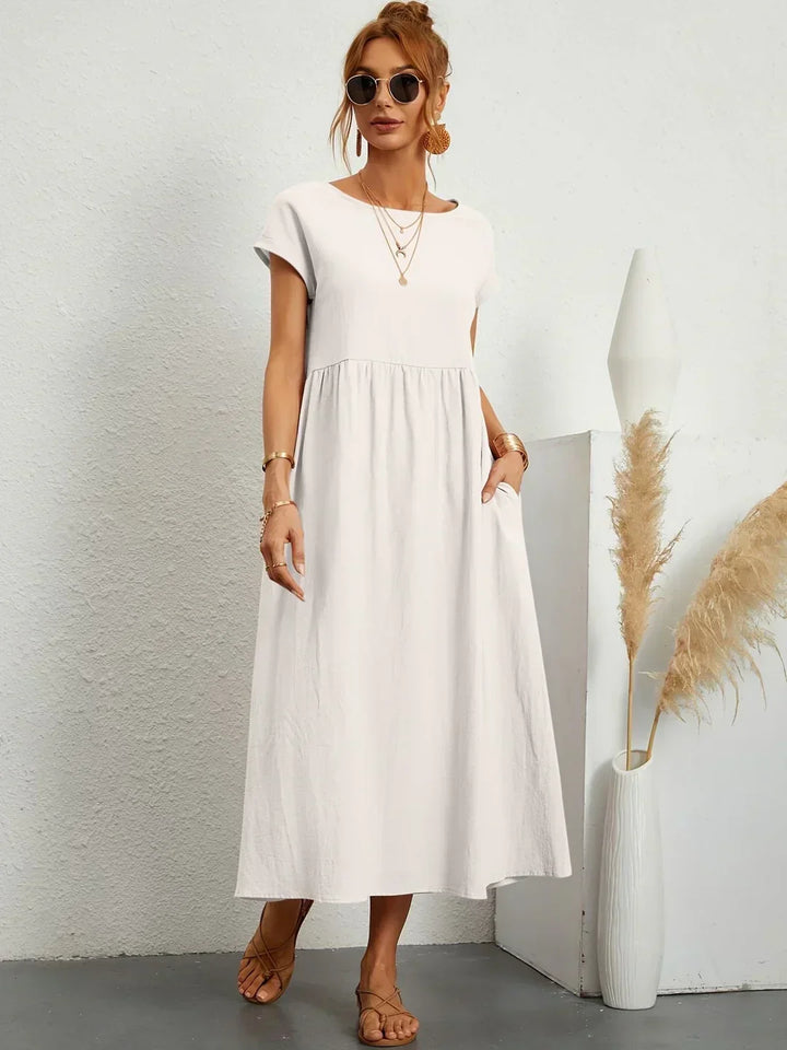 Timeless elegance in a women's flowing midi dress, designed for comfort and style.