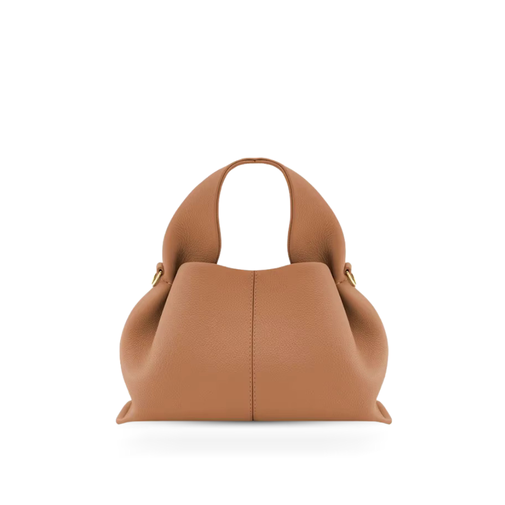 Elegant magnetic shoulder bag for women, a classic faux leather accessory perfect for everyday use.
