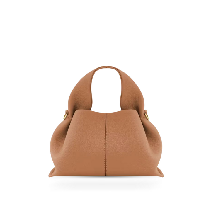 Elegant magnetic shoulder bag for women, a classic faux leather accessory perfect for everyday use.