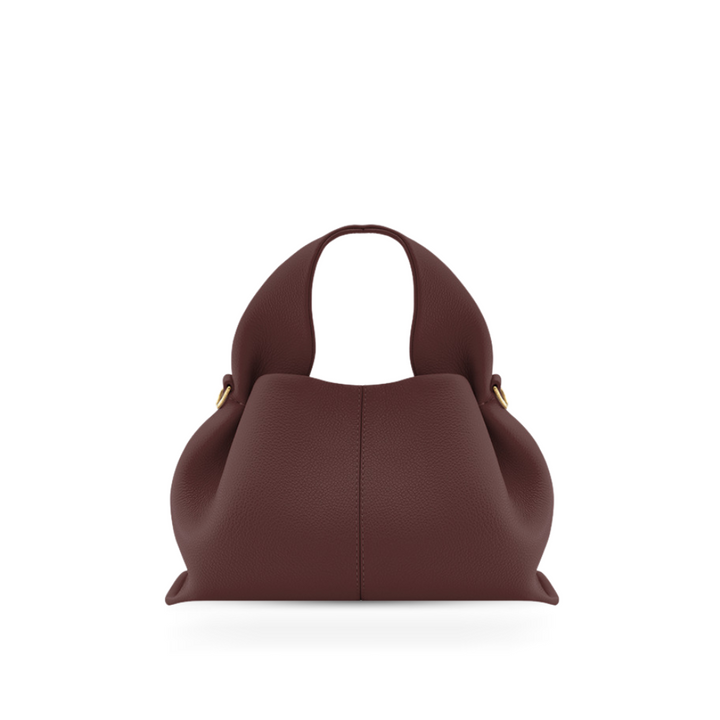 Everyday magnetic shoulder bag for women, featuring a classic design & convenient magnetic closure.