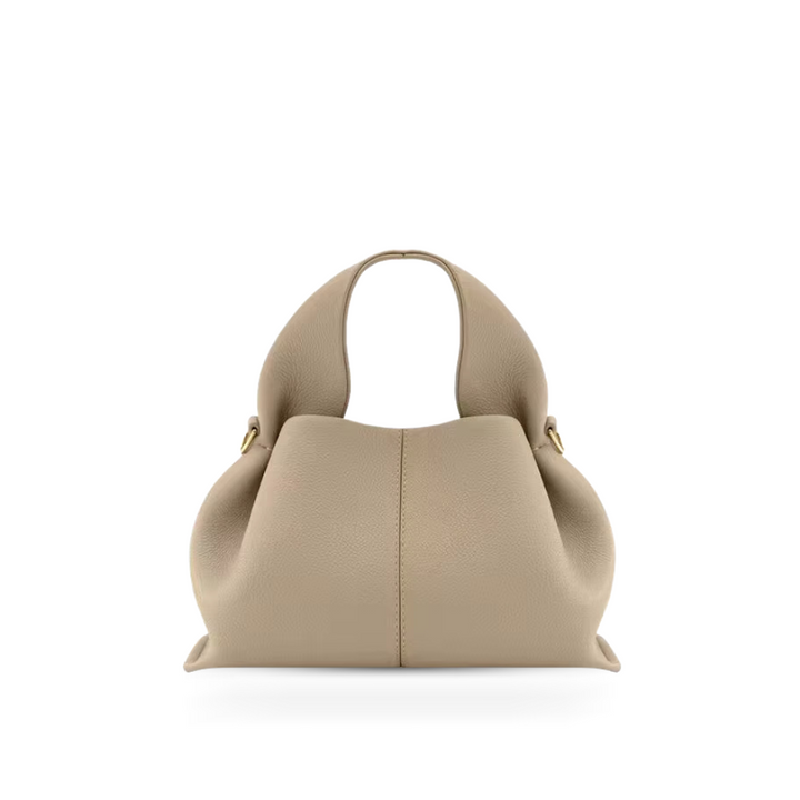Stylish women's elegant magnetic shoulder bag, a versatile faux leather accessory for daily needs.
