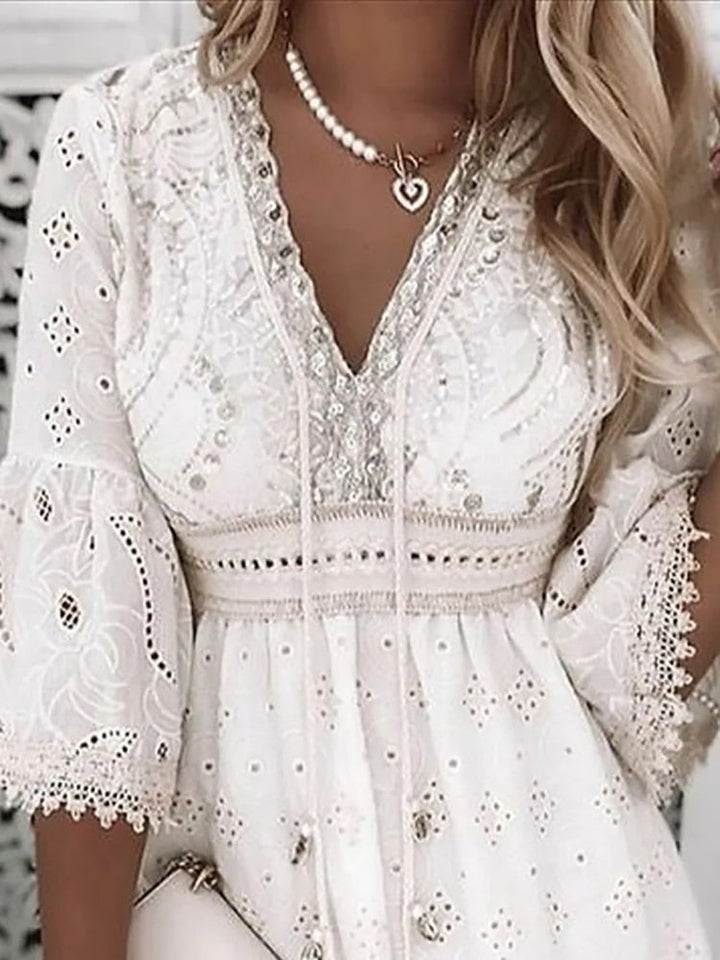 Women's boho lace summer dress with half sleeves. Effortlessly chic and airy, perfect for beach or casual wear.