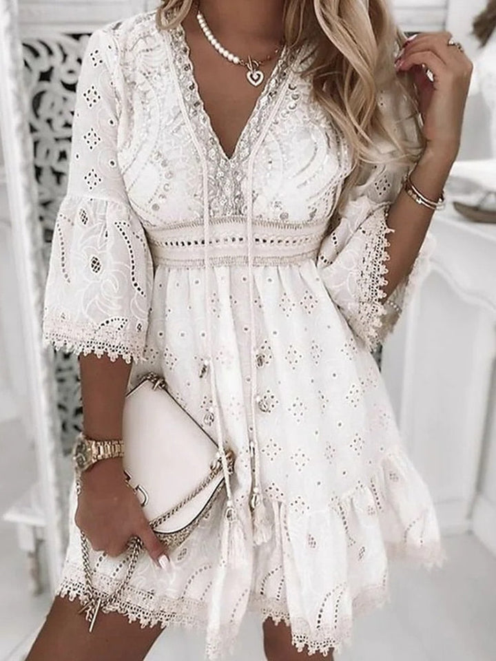 Stylish women's boho lace summer dress with half sleeves. Elegant and comfortable, great for spring/summer fashion.