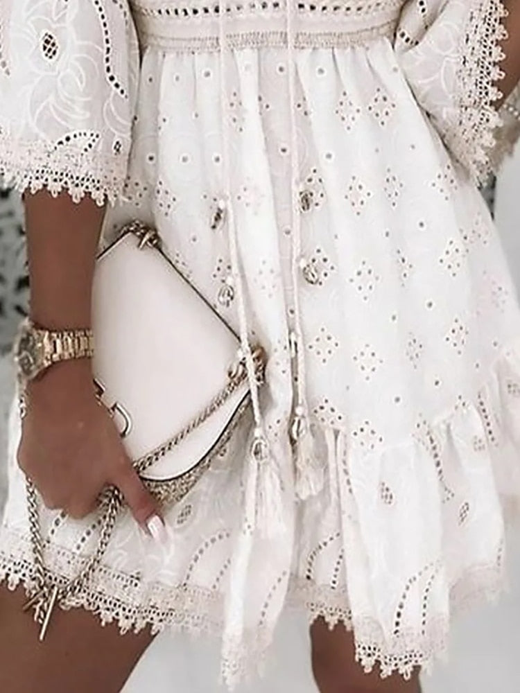 Elegant women's flowy boho summer dress with delicate lace & half sleeves. Ideal for vacations or spring outings.